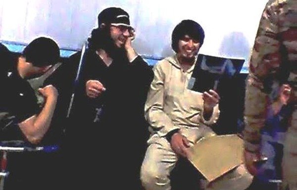 Foreign elements of the 'Islamic State of Iraq and the Levant' are pictured at a hospital. [Photo courtesy of Syrian media activist 'Abu Sham al-Raqa’]