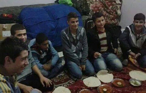 Teenage boys from Kobani who were kidnapped by the 'Islamic State of Iraq and the Levant' in 2014 pose for a photo after their release. [Photo courtesy of the 'Return the abducted people of Kobani' Facebook page]