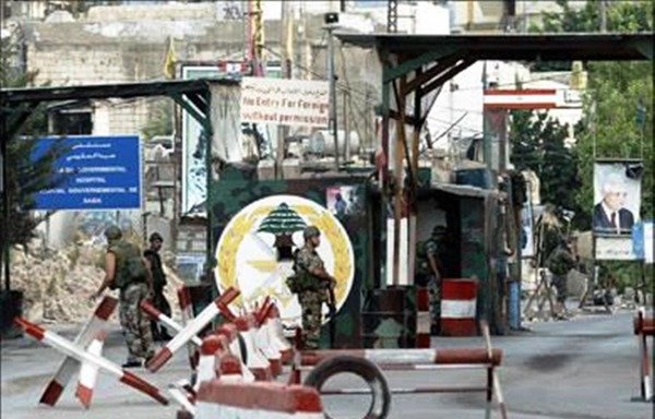 Soldiers from the Lebanese army man a checkpoint at the entrance to Ain el-Hilweh camp in Sidon. [Photo courtesy of the Lebanese army’s guidance directorate]