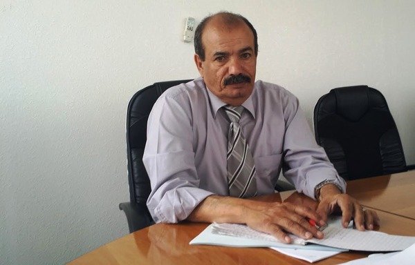 Ahmed Jaber al-Sanabani, chairman of the National Committee on Anti-Money Laundering and Combating the Financing of Terrorism, met with Al-Mashareq in his Sanaa office. [Faisal Darem/Al-Mashareq]