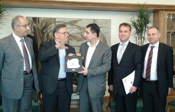 Lebanese Minister of Industry Hussein Hajj Hassan meets with Central Bank of Iran governor Valiollah Seif. [Photo courtesy of Lebanon's National News Agency]