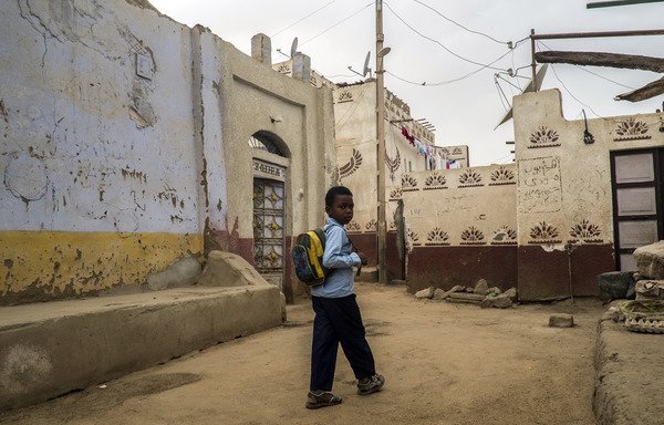 An Egyptian school boy walks in Gharb Aswan village, near Aswan, on March 13th. Panelists at a recent conference in Cairo focused on education and its deterrent effect on the spread of terrorism in Egypt and the world. [Khaled Desouki/AFP]