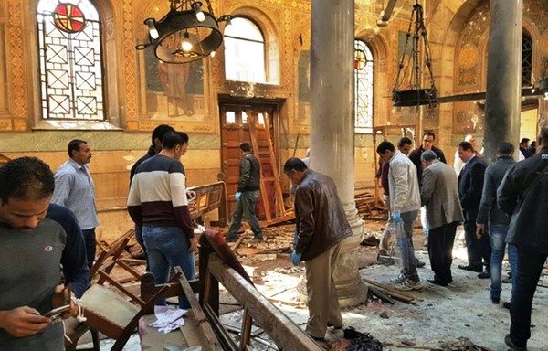Egyptian investigators inspect the scene of a bomb explosion at the Coptic Church of Saint Peter and Saint Paul in Cairo on December 11th. [Photo courtesy of the Middle East News Agency]