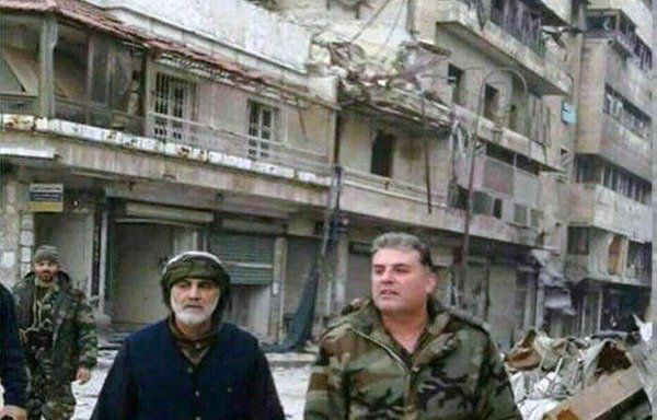 Elite Quds Force commander Maj. Gen. Qassem Soleimani (left) tours eastern Aleppo in this widely circulated photograph. [Photo circulating on social media]