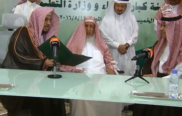 Saudi clerics are seen in an 'Islamic State of Iraq and the Levant' video in which the group incites against Muslim scholars who oppose it. [Screenshot from the video]