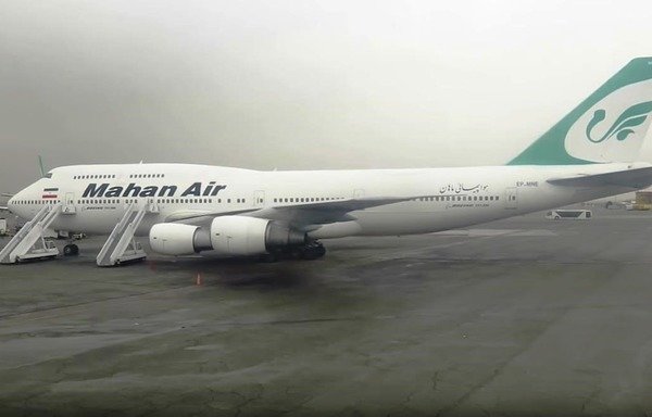 A Mahan Air plane sits on the tarmac at Damascus airport. Experts say Iran has been using the privately-owned carrier to transport weapons, military equipment and foreign fighters to various conflict zones in the Middle East. [Photo courtesy of Mohammed al-Abdullah]