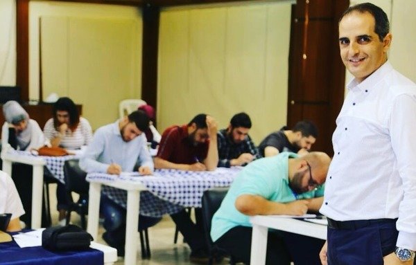 Reporter and news anchor Yazbek Wehbe of the Lebanese Broadcasting Corporation leads a media training session at al-Rabita el-Sakafia in Tripoli. [Photo courtesy of Yazbek Wehbe]