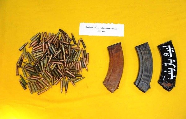 Saudi authorities display ammunition seized at a cache used by extremists. [Photo courtesy of Saudi Press Agency]