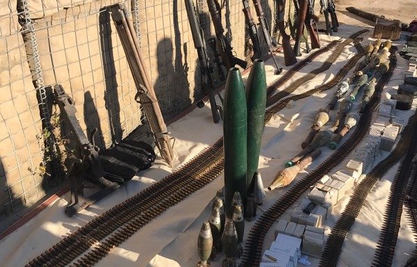 Lebanese forces display weapons and ammunition seized from smugglers in a 2016 raid. [Photo courtesy of the Army’s Directorate of Guidance]