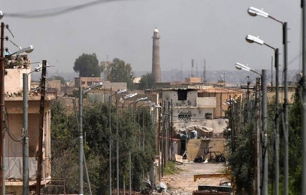 Before being reduced to rubble by the 'Islamic State of Iraq and Syria' on June 21st, Mosul's historic al-Nuri Mosque had graced the city's skyline for centuries. [Photo courtesy of Iraqi Military Encyclopedia]