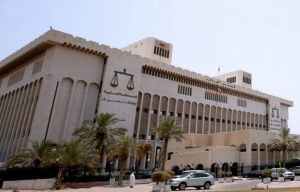 A picture taken on June 18th shows a general view of the Palace of Justice in Kuwait City, which is home to Kuwait's supreme court. Last month, Kuwait's supreme court sentenced the mastermind of a cell to life in jail and condemned 20 others to various prison terms for alleged links with Iran. [Yasser Al-Zayyat/AFP]