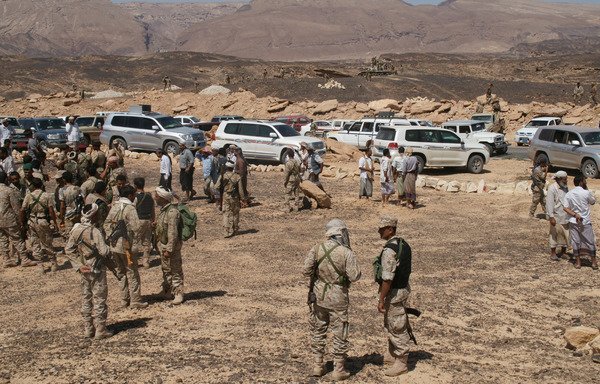 Yemeni soldiers re-group after taking control of Azzan, an al-Qaeda stronghold in Shabwa province, on May 8th, 2014. The city is one of the areas targeted by a new military campaign to oust al-Qaeda that kicked off on Thursday (August 3rd). [AFP PHOTO/STR]