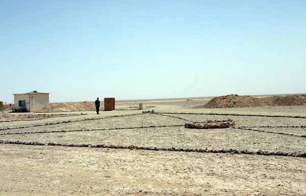 A view of a desert post on the Syrian side of the Iraqi-Syrian border. Iran's Revolutionary Guards are trying to control key points like this in order to complete an uninterrupted land corridor route between Tehran and Beirut. [Louai Beshara/AFP]