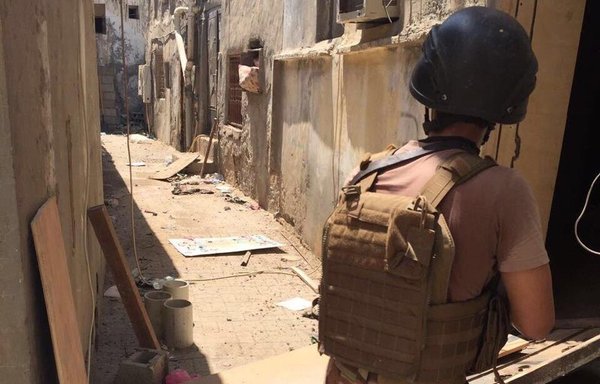 A member of the Saudi Special Forces patrols the Eastern Province town of Awamiya after the security operation ended. [Photo courtesy of the Saudi Press Agency]
