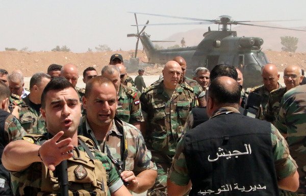 Lebanese army chief Gen. Joseph Aoun arrives at an operational command post in the eastern town of Ras Baalbek on Wednesday (August 23rd) as troops conduct an operation against the 'Islamic State of Iraq and Syria' on the country's border with Syria. [STRINGER/AFP]