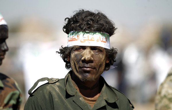 A newly recruited Houthi fighter takes part in a gathering in Sanaa to mobilise more fighters on January 3rd. [Mohammed Huwais/AFP]