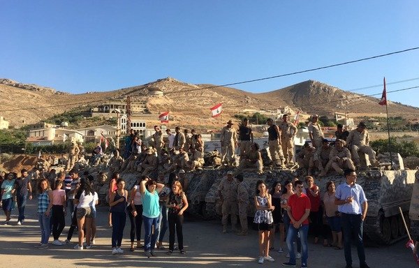 Arsal residents celebrate the Lebanese army's liberation of the outlying areas of their town from the 'Islamic State of Iraq and Syria'. [Photo courtesy of Jocelyn Abu Farhat]