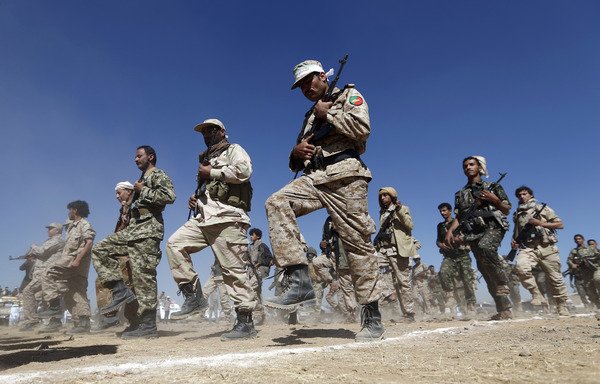 Newly recruited Houthi fighters take part in a gathering in Sanaa on January 3rd. Yemeni experts have called on the US to take tougher measures to prevent Iran from arming the group. [Mohammed Huwais/AFP]