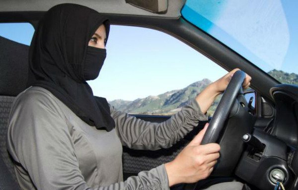 A female Saudi activist drives a car in 2016 as part of a call for ending the ban on women driving. On September 26th, King Salman issued a decree lifting the ban on driving. [Photo courtesy of Saudi activist Manal al-Sharif]