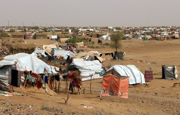 Internally displaced persons who fled the fighting in the Harad area of Abs district in Yemen's Hajjah province have taken shelter in this makeshift camp, pictured here on July 23rd. [STRINGER/AFP]