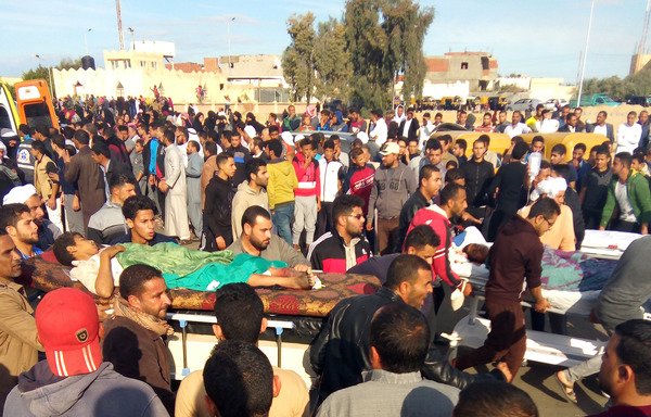 Egyptians carry victims on stretchers following a gun and bombing attack on the Rawda mosque near the North Sinai provincial capital of al-Arish on November 24th. [AFP]