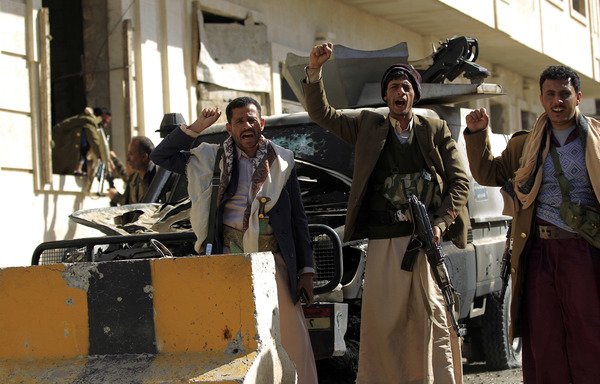 Houthi fighters are seen outside the residence of Yemen's former President Ali Abdullah Saleh in Sanaa on December 4th, the day the Iran-backed militia announced his "killing". [Mohammed Huwais/AFP]