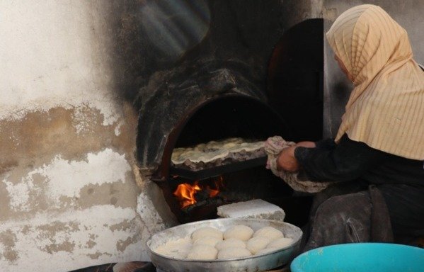 A woman works at a bakery established by the Masar al-Khair initiative in the village of Jaraf al-Darawish in southern Jordan. [Photo courtesy of Masar al-Khair]