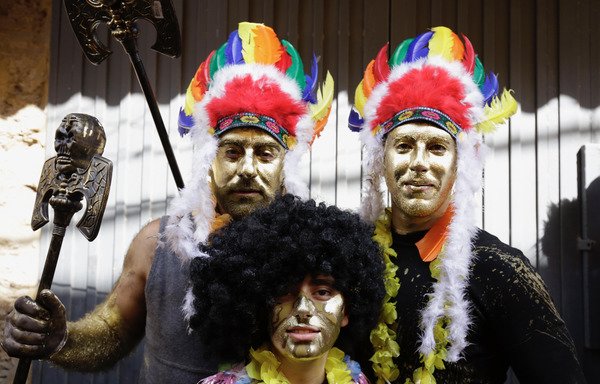 Lebanese take part in the Zambo carnival held in Tripoli on February 18th. The inspiration of the annual celebration is unclear, though it is a local tradition that stretches back over a century. [Ibrahim Chalhoub/AFP]