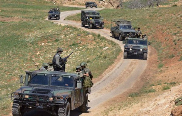 Lebanese army vehicles drive along a road near the country's eastern border with Syria. [Photo courtesy of Lebanese Army Directorate of Orientation]