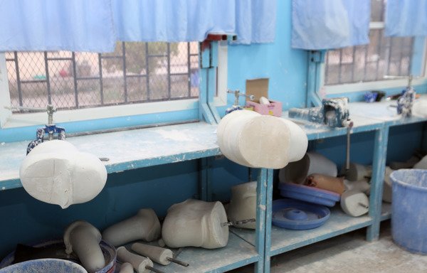 A picture taken on January 29th shows the prosthetics and artificial limb department at the Marib hospital. [Abdullah al-Qadry/AFP]
