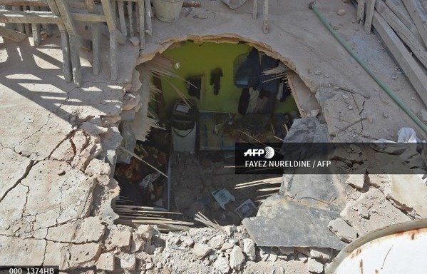 A picture taken March 26th in Um al-Hammam district in Riyadh shows the pierced ceiling of a home hit by falling shrapnel from Houthi missiles intercepted over the Saudi capital the previous day. One Egyptian was killed by falling shrapnel. [Fayez Nureldine/AFP]