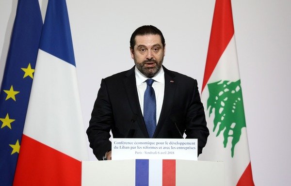 Lebanese Prime Minister Saad al-Hariri addresses the Cedre conference at The Foreign Affairs Ministry in Paris on April 6th. International donors pledged $11 billion in low-interest loans and aid for Lebanon at a conference in Paris to try to avert an economic crisis in a country hard hit by the fallout from the Syrian war. [Ludovic Marin/POOL/AFP]