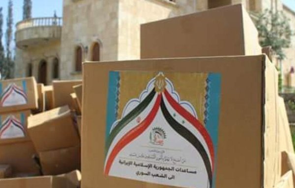 Iran's Islamic Revolutionary Guard Corps has been providing aid to some parts of Syria in what observers say is an attempt to secure support for its presence in the country and implement its expansionist plan in Syria and the region. [Photo courtesy of Sheyar Turko]