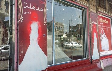 Houthis remove women's images from shops