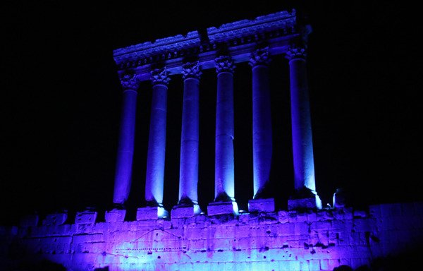 A photo taken on October 24th, 2015 shows part of the temples of Baalbek, a UNESCO world heritage site in Lebanon's eastern Bekaa Valley, illuminated in blue light as part of the 'Turn the World UN Blue' Campaign to celebrate the 70th anniversary of the UN. [AFP PHOTO/STR]