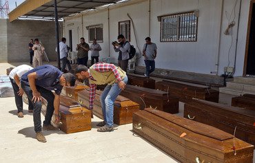 أقباط مصر ينتظرون عودة جثث ضحايا داعش من ليبيا