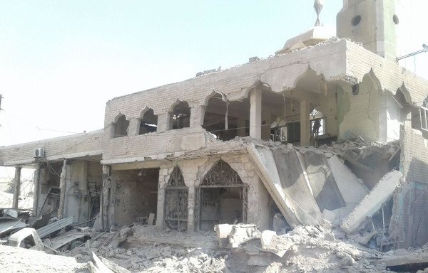 Buildings in Syria's Eastern Ghouta region show heavy damage caused by regime airstrikes. [Photo courtesy of Mazen al-Rifi]