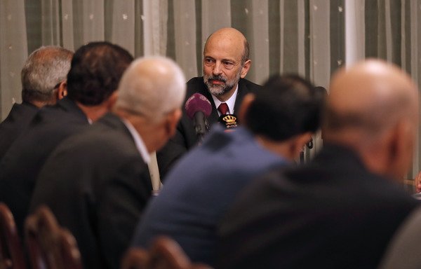 Newly appointed Jordanian Prime Minister Omar al-Razzaz meets with union leaders in Amman on June 7th. [Ahmad Gharbali/AFP]