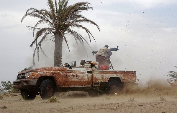 A Yemeni soldier fires a B-10 recoilless gun near the city of al-Jah, 50 kilometres from the port city of al-Hodeidah, in this file photo, taken June 7th. [Nabil Hassan/AFP]