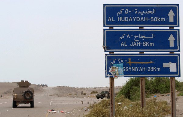 A photo taken on June 2nd during a tour organised by pro-government Yemeni fighters shows an armoured vehicle of the pro-government forces on a main road in al-Hodeidah province. [Saleh al-Obeidi/AFP]