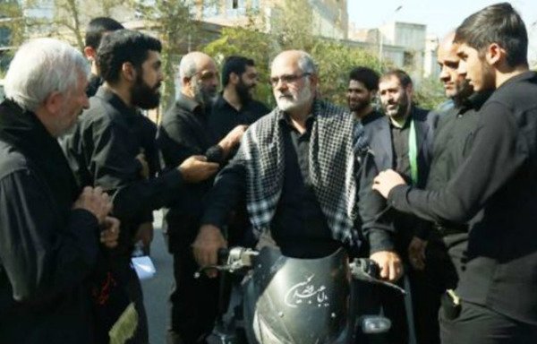 Ansar-e-Hizbullah members gather around the leader of their group, an IRGC-affiliate that has been sanctioned by the US Treasury on May 30th, 2018. [Photo courtesy of Sheyar Turko]