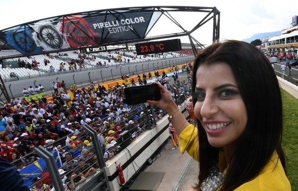 In this file photo taken on June 24th, 2018, Aseel Al-Hamad, Saudi Arabia's first female racing driver and board member of the Saudi Arabian Motor Federation (SAMF), poses for a picture ahead of the Formula One Grand Prix de France at the Circuit Paul Ricard in Le Castellet, southern France. [Boris Horvat/AFP]