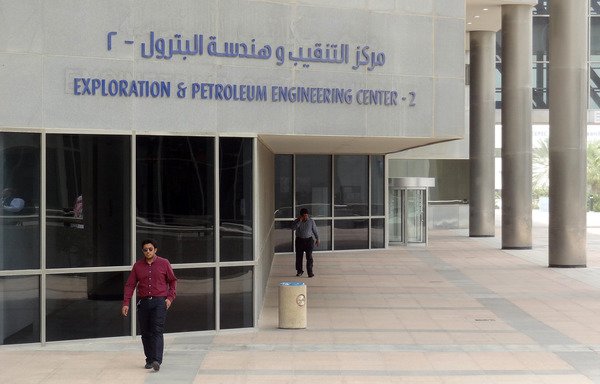 This file photo taken on May 10th, 2016 shows administration buildings at the Saudi Aramco headquarters in Dhahran. [Ian Timberlake/AFP]