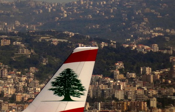 A picture taken on April 11th, 2014 shows a Middle East Airlines commercial plane sitting on the tarmac of Beirut Rafic Hariri International Airport. [Patrick Baz]