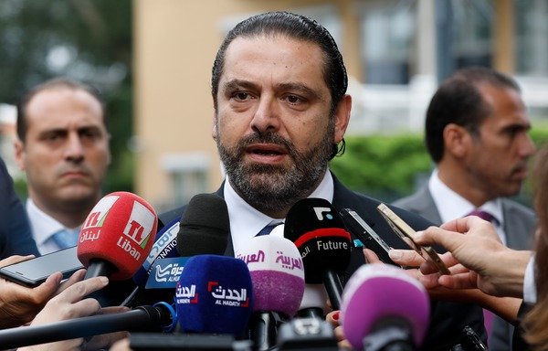 Lebanese premier-designate Saad al-Hariri on September 10th, speaks to the press in front of the Special Tribunal for Lebanon in The Hague after the presentation of the closing arguments in the trial of four Hizbullah suspects accused of the 2005 assassination of his father Rafiq al-Hariri. [Bas Czerwinski/ANP/AFP]
