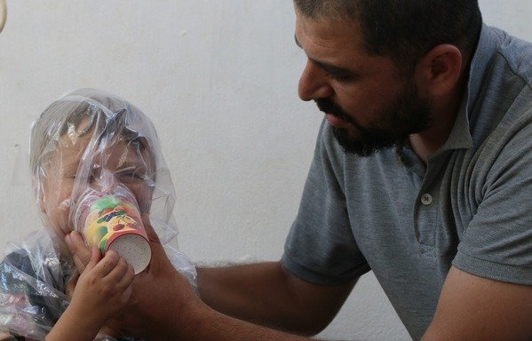 Idlib residents have been making homemade gas masks by using materials such as cotton and coal stuffed into cardboard boxes or cups, as a precautionary measure in the event Idlib comes under chemical attack. [Photo courtesy of Syrian Civil Defence]