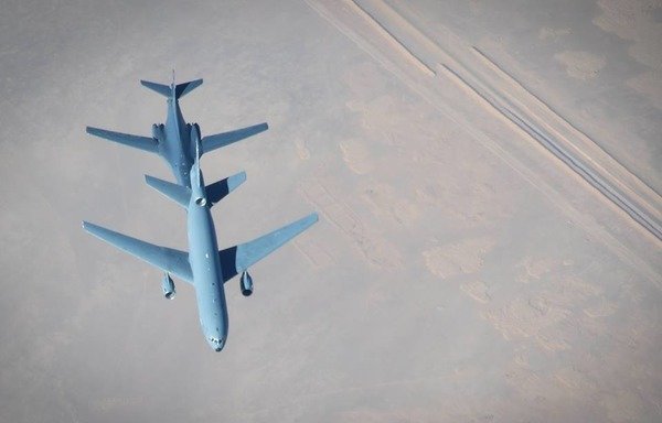 A US Air Force B-1B Lancer aircraft is refueled by a KC-10 Extender over an undisclosed location April 14th, 2018. The aircraft were taking part in strikes against Syrian targets in response to the use of chemical weapons. [Staff Sgt. Erica Rodriguez/US Air Force Central Command]