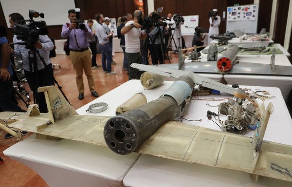 A picture taken June 19th shows debris of Iranian-made Ababil drones displayed in Abu Dhabi, which the Emirati armed forces say were used by the Houthis in battles against the Arab coalition forces in Yemen. [Karim Sahib/AFP]