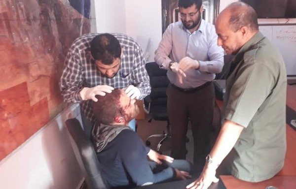 Hesham Ashmawi, the Egyptian leader of al-Qaeda-linked al-Mourabitoun, receives medical attention after Libyan forces arrested him in Derna. [Photo courtesy of the official spokesman of the Libyan Armed Forces]