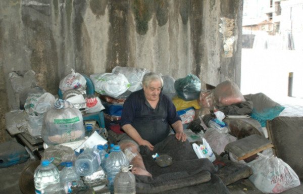 A homeless man has been living for years under a bridge in the Dora area of Beirut. Lebanon is seeking to curb its poverty rate which now stands at around 30%. [Nohad Topalian/Al- Mashareq]
